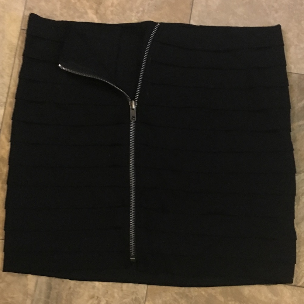 Black ruffled mini skirt